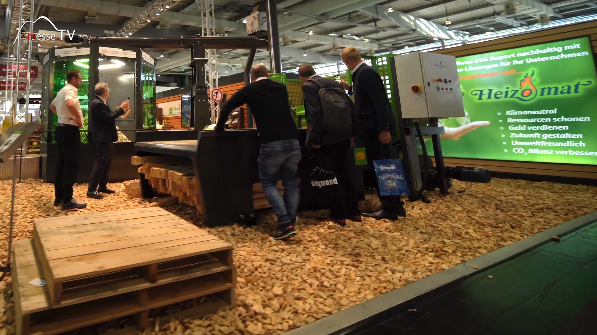 exhibition stand heizomat fully automatic woodchip heaters euroblech 2024 exhibition hannover