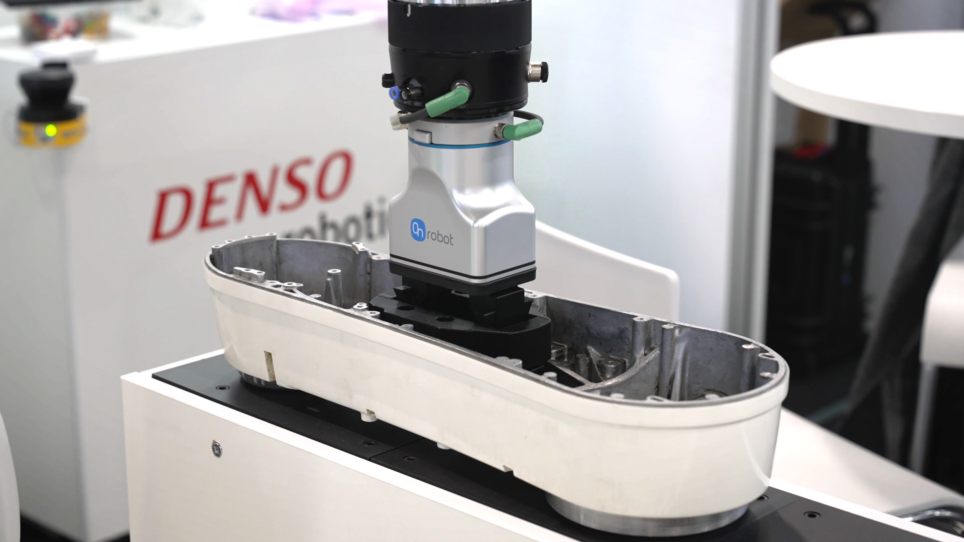 denso collaborative robot assists human in working steps