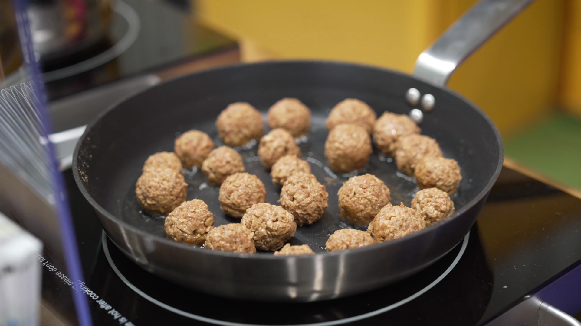 meatballs made from chopped sunflower seeds in a pan